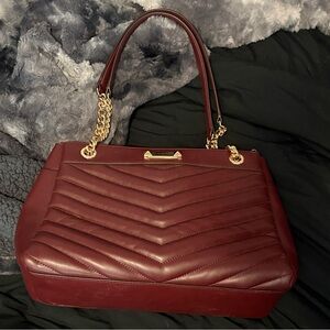 Michael Kors oxblood three pocket medium tote bag